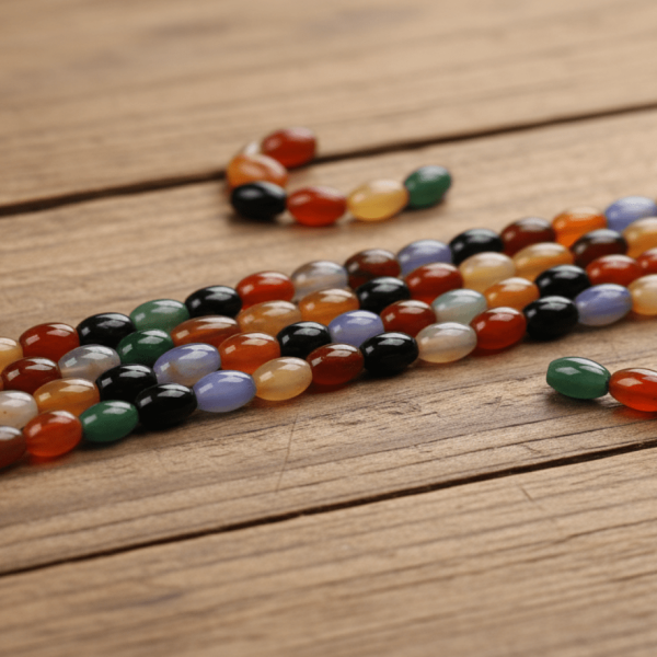 Karışık Akik Doğaltaş – 8x12 mm Arpa Kesim Dizi Taş | Denge ve Zarafet